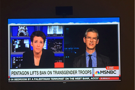 Aaron Belkin speaking with Rachel Maddow on news television program